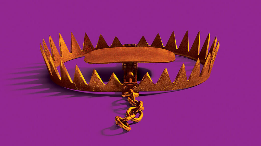 Against a purple background is a simple gold crown with a chain link coming out the front and a scale or small stage in the center of the crown.