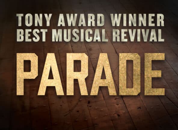 Image of the logo for the Parade tour. An image of dark brown wooden floorboards with a radial shadow. On top of the image, there is white text reading "TONY AWARD WINNER" and "BEST MUSICAL REVIVAL". Underneath the white text, larger metallic gold text reads "PARADE".